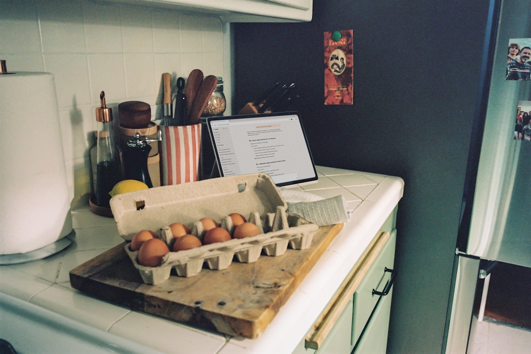 About carton-of-brown-eggs-on-a-kitchen-counter-e6w48upkijo