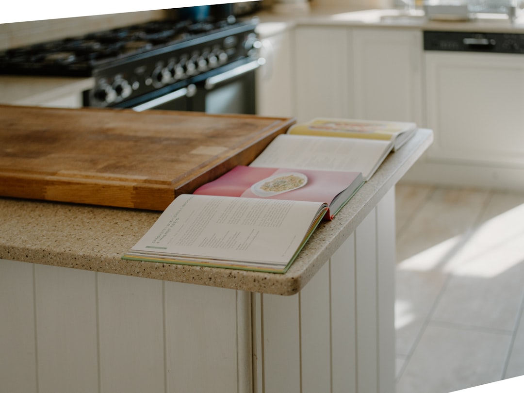 About open-cookbooks-rest-on-a-kitchen-counter-yjyxtxloif4